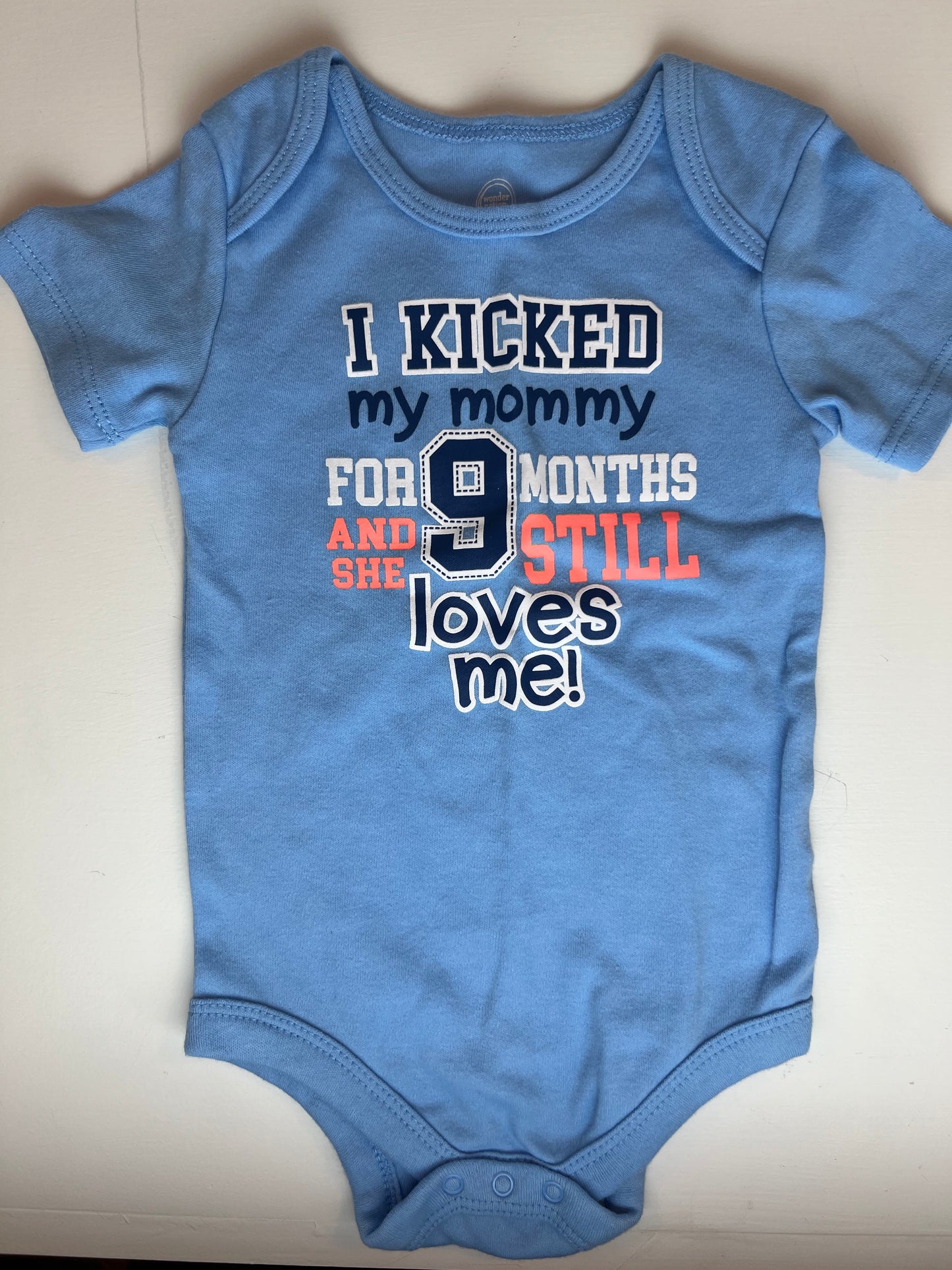 Wonder Nation I Kicked Mommy for 9 Months Onesie